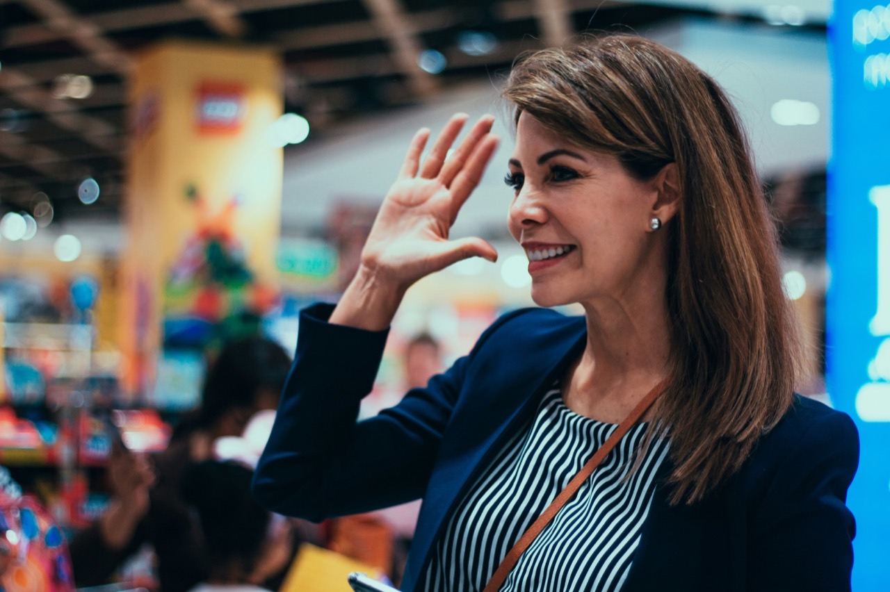Women greeting each other at a conference